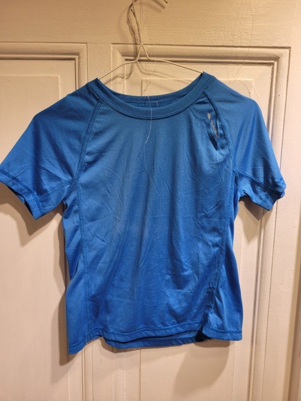Producto - Remera QUECHUA azul Talle 6/8 años - PRECIO: 11X