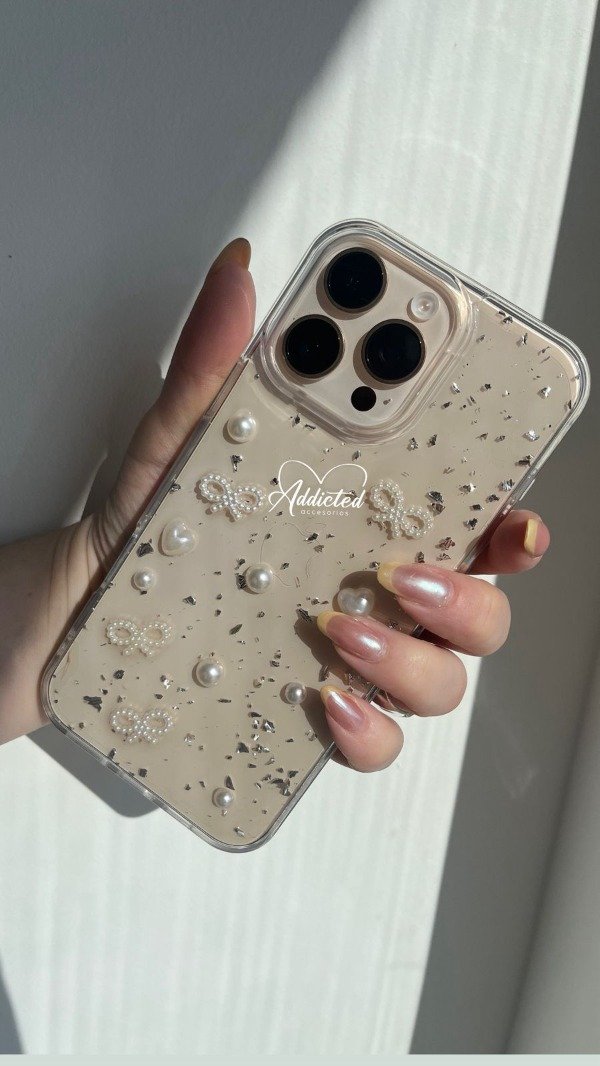 Producto - Case moños plateados y perlas