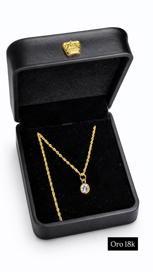 Producto - Dije de oro 18k piedrita blanca