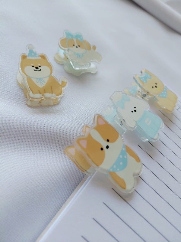 Producto - Ganchos para hojas perros pastel