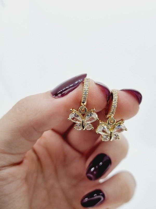 Producto - Aros acero dorado argollita strass colgante mariposa gema plat