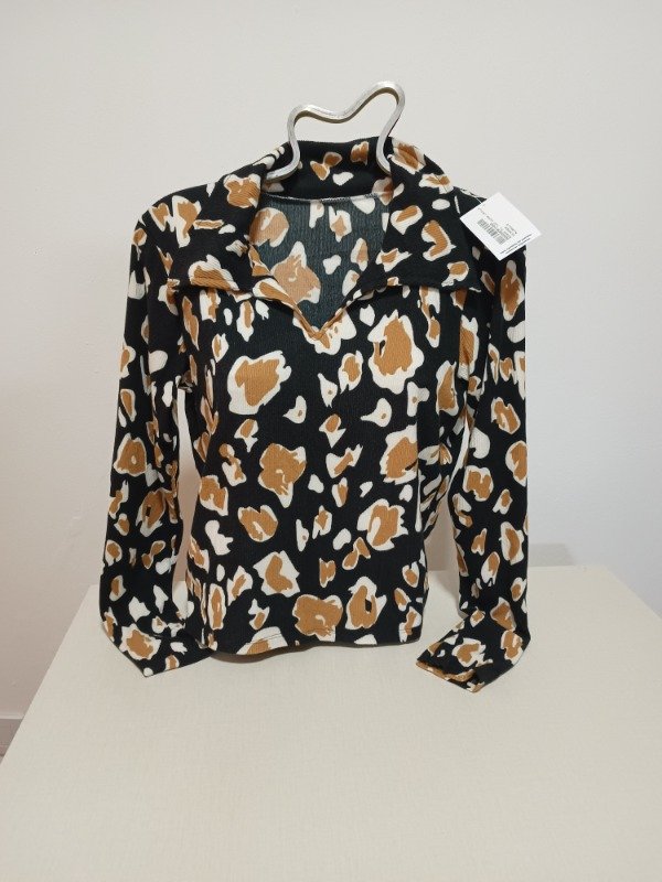 Producto - Remera Tipo Chomba Lanilla