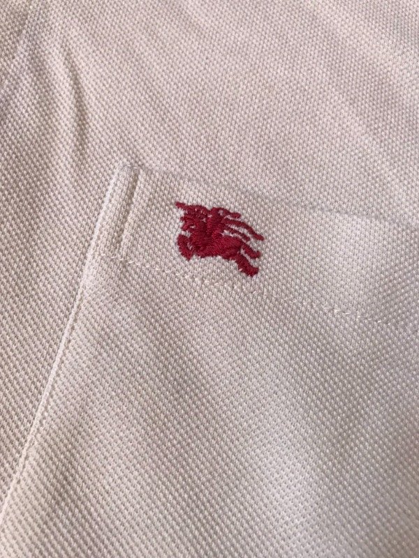 Producto - Vintage Burberry cream polo shirt.