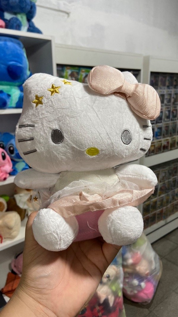 Producto - Peluche SANRIO Hello Kitty vestido plateado