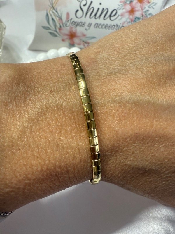 Producto - Pulsera de acero dorado
