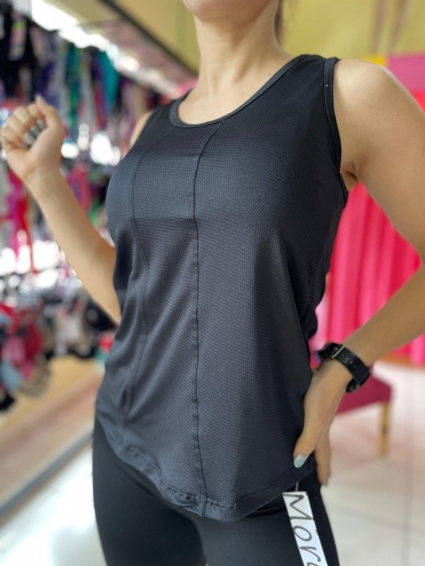 Producto - Musculosa dry fit negra talle 4-5