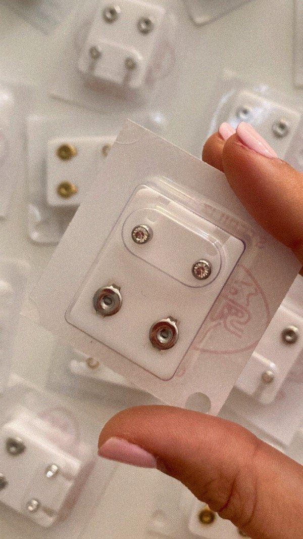 Producto - Par de aros acero plateado. Repuesto perforadora