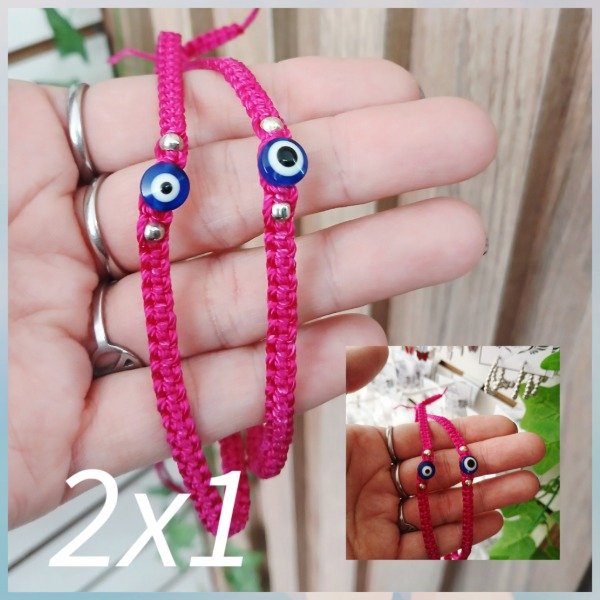 Producto - 2x1 pulseras de ojos fuscia