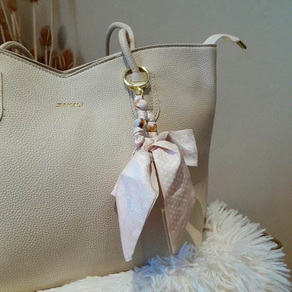 Producto - Cartera Sakali con charm con moño - 1