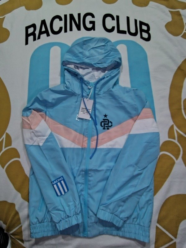 Producto - Campera rompeviento celeste