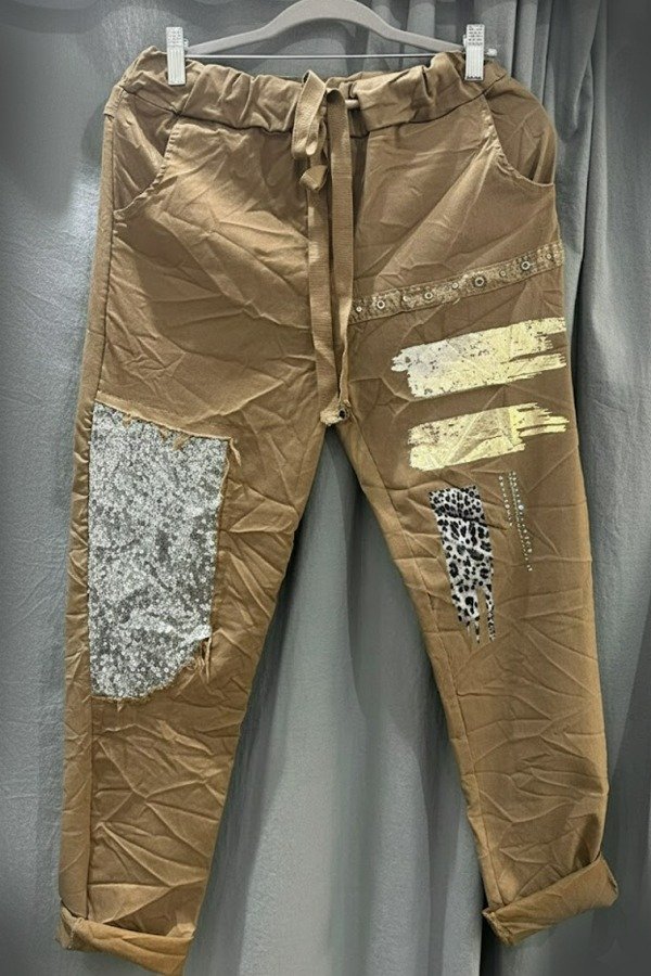 Producto - BABUCHA OCRE CON DETALLES. Cede hasta 130