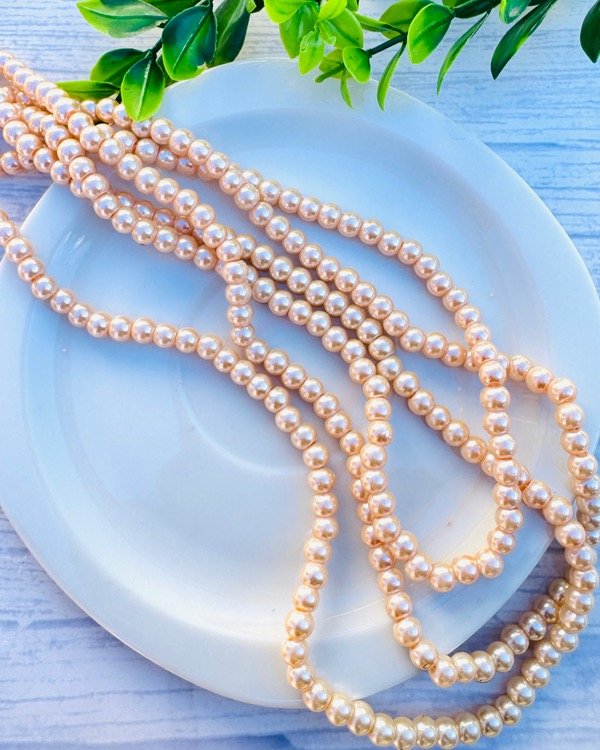 Producto - TIRA PERLA BEIGE 6MM