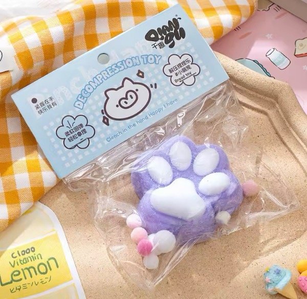 Producto - Taba Squishy Lila y Blanco