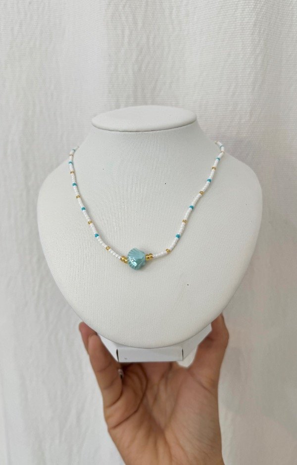 Producto - Collar caracol celeste