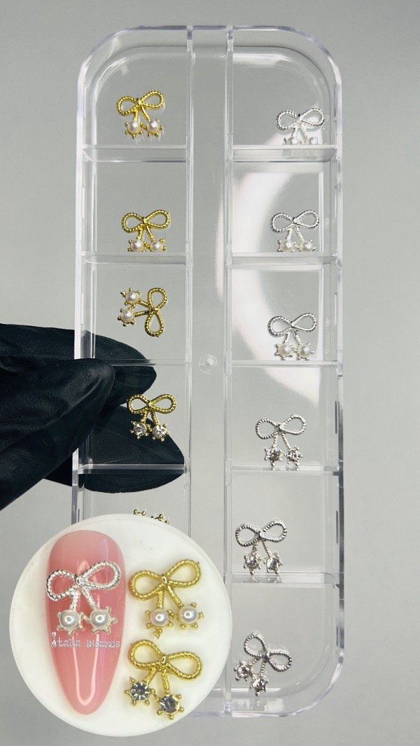 Producto - Moños dorados y plateados con perlas x12