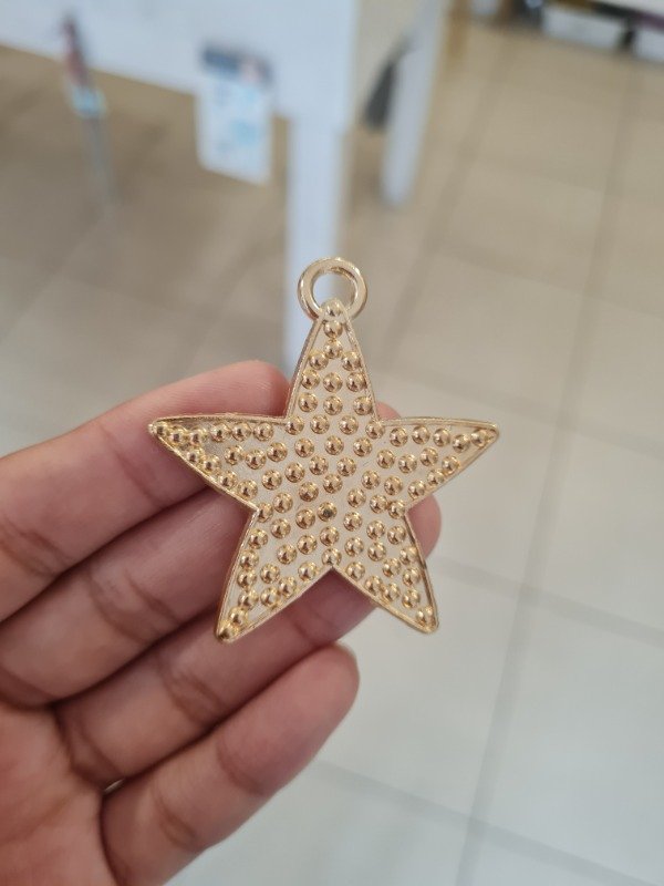 Producto - DIJE DORADO ESTRELLA PUNTOS