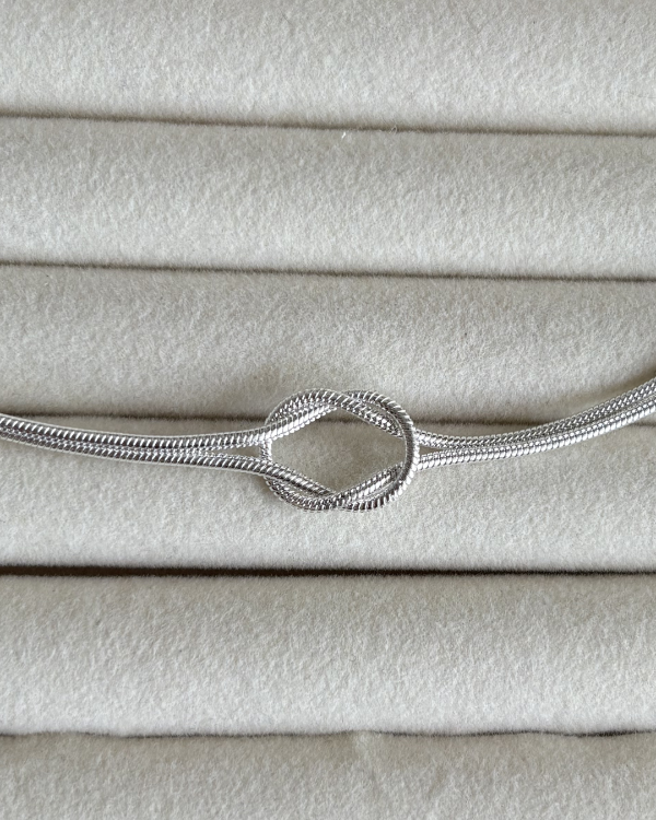 Producto - Pulsera clapton con nudo central de acero blanco 18-23cm