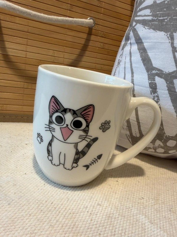 Producto - Taza gato sonriente - (Efectivo: 7.920)