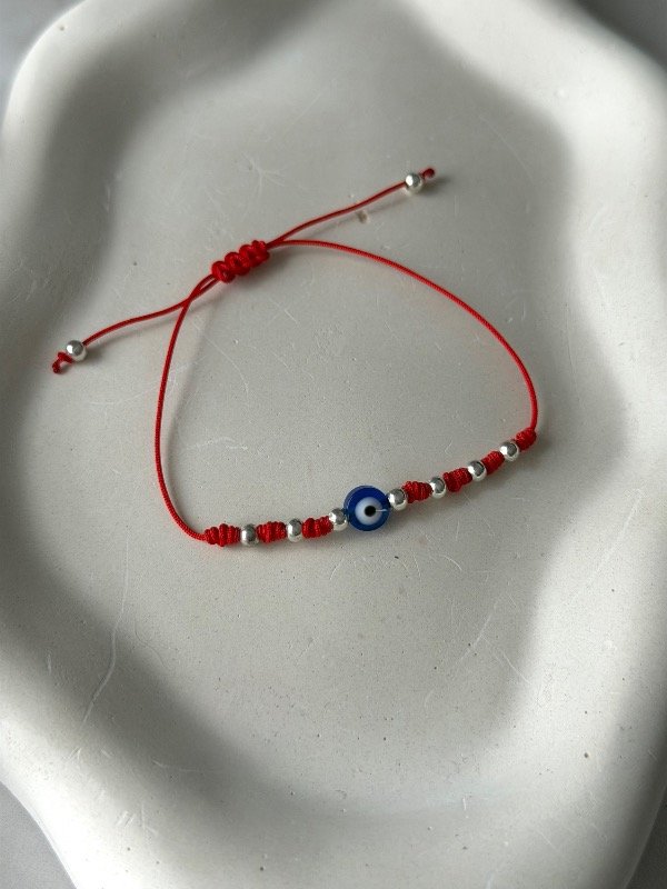 Producto - Pulsera hilo rojo nudo ojito - 1