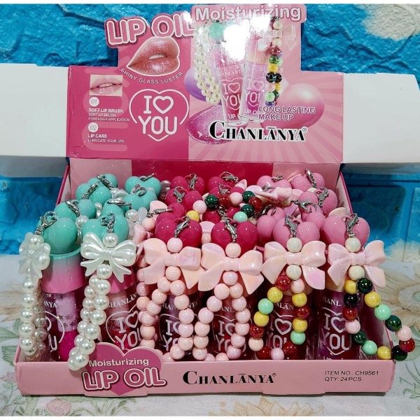 Producto - Brillo labial con charm