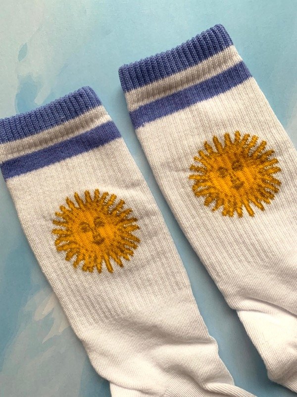 Producto - Sol rayas celeste