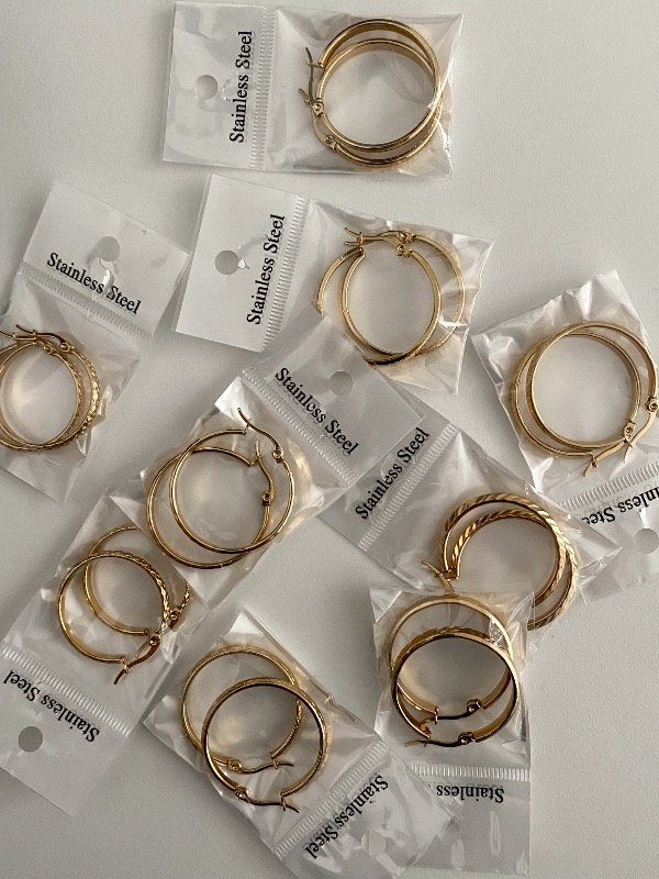 Producto - Argollas 2.8cm con diseño. MODELO AL AZAR