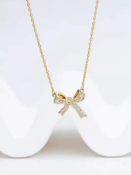 Producto - Collar Moño Dorado con strass