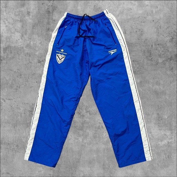 Producto - PANTALÓN ROMPEVIENTOS VELEZ 2005/06