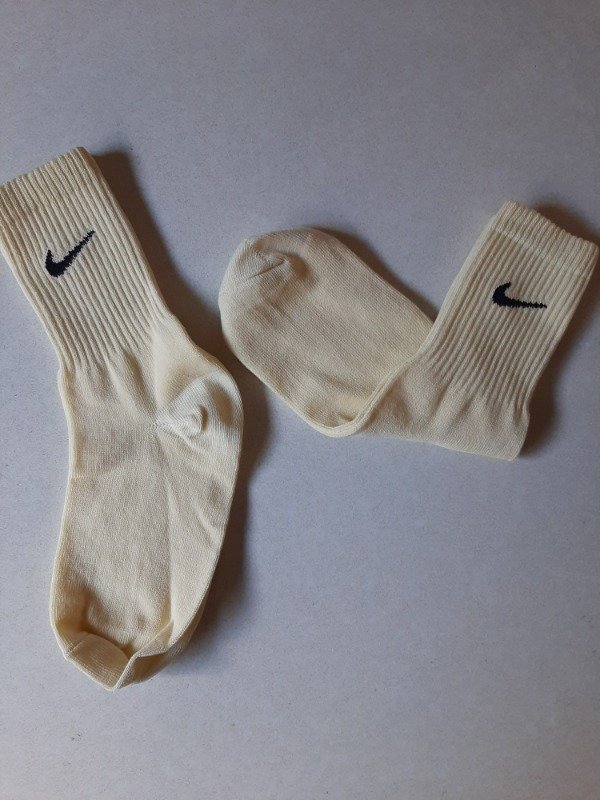 Producto - Media caña adulto - Nike amarillo claro pipa negro