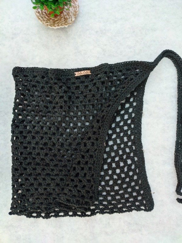 Producto - Pareo Negro con detalles arandelas. Talle S