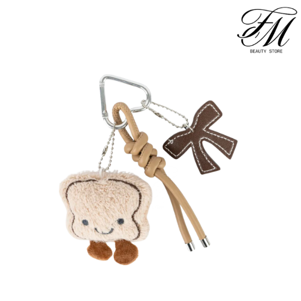 Producto - CITY GIRL LLAVERO CHARM TOSTADA - 1