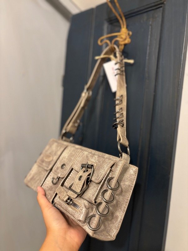 Producto - CARTERA TACHAS