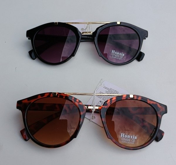 Producto - LENTES DE SOL REDONDO CON MONTURA