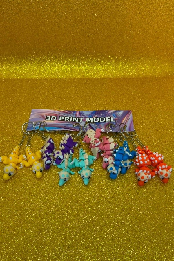 Producto - LLAVERO DINO CHIQUITO 3D