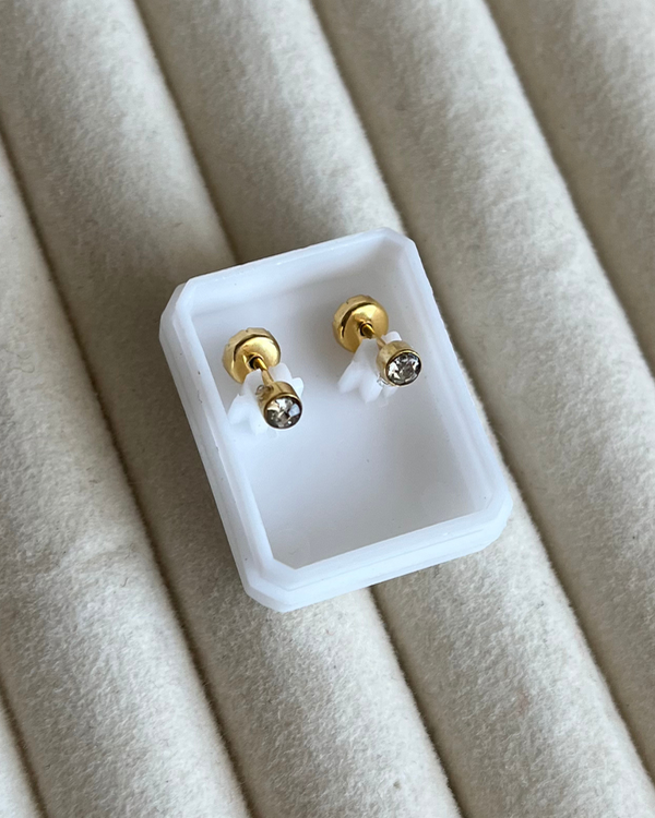 Producto - Abridores con brillante de acero dorado