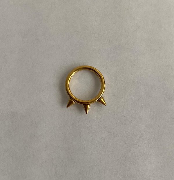 Producto - Clicker con púas dorado