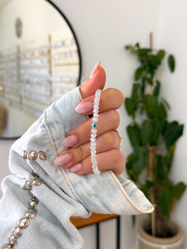 Producto - Pulsera acero quirúrgico transparente ojito