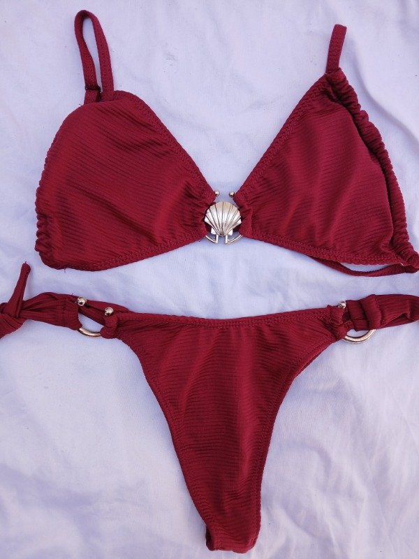 Bikini con accesorio bordo talle 85