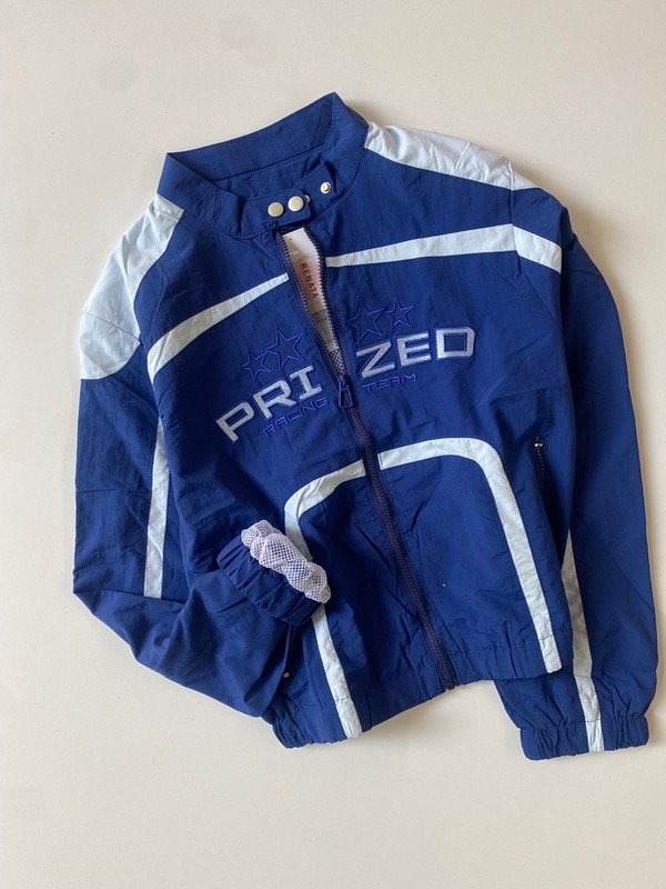 Producto - Jacket rompeviento combinada azul