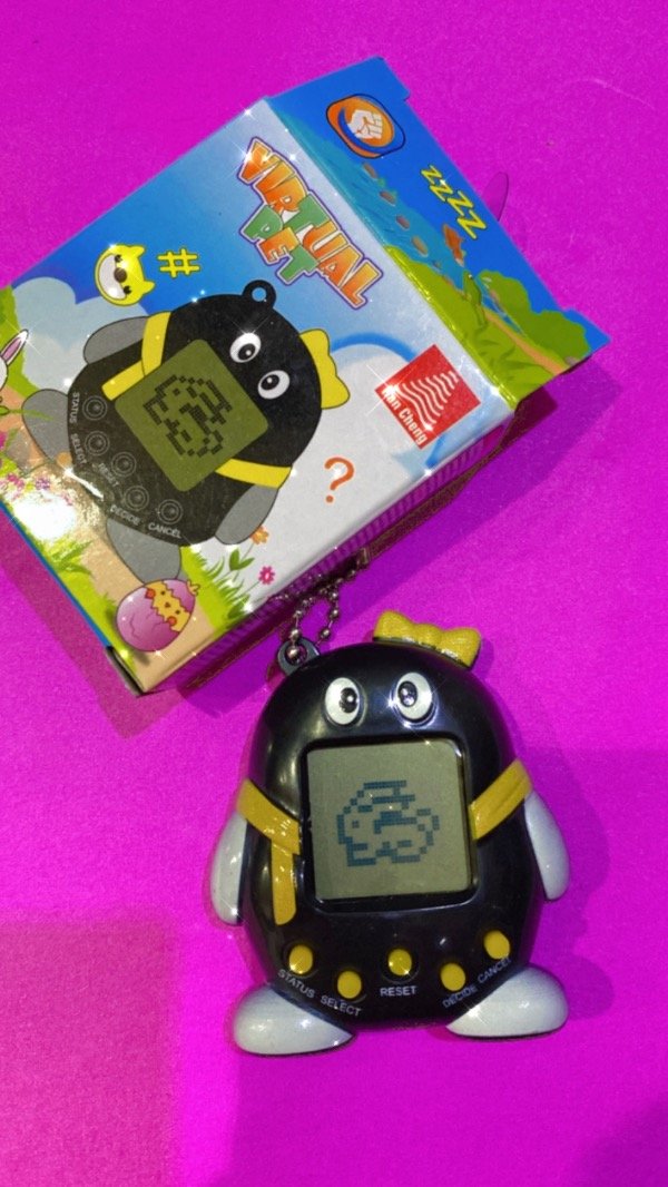 Producto - TAMAGOCHI NEGRO