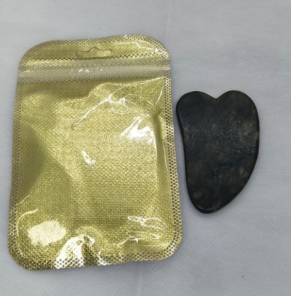 Producto - Piedra guasha de jade bolsa dorada MYE12