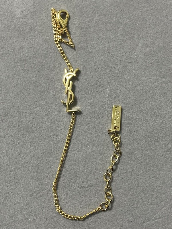 Producto - YSL dorado grabada