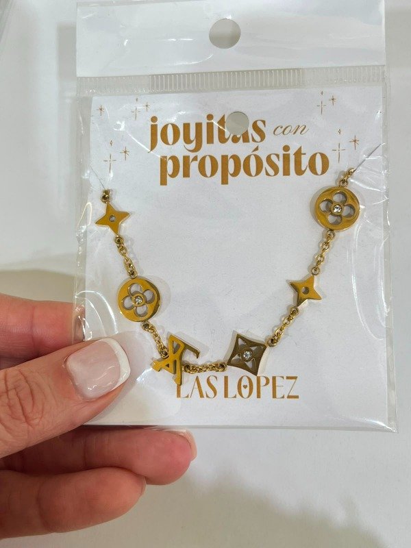 Producto - Pulsera IvesSaintLaurent dorada