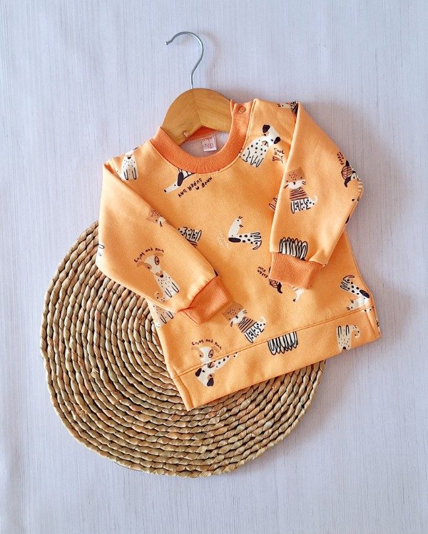 Producto - Buzo FRIZADO (perritos naranja)