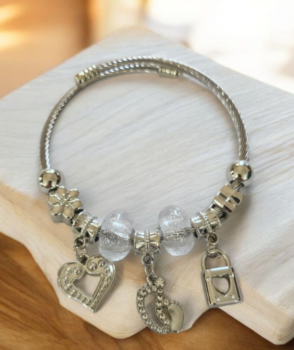 Producto - Pulsera acero dona transparente