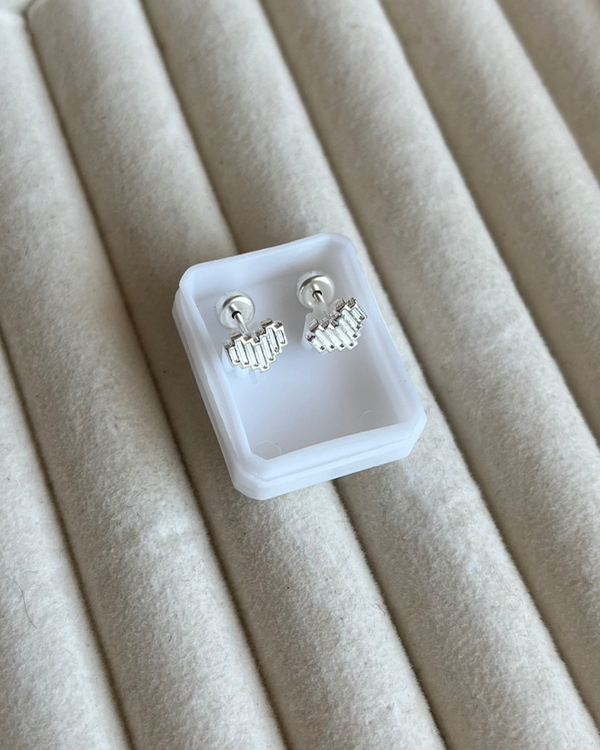 Producto - Abridores corazón de acero blanco