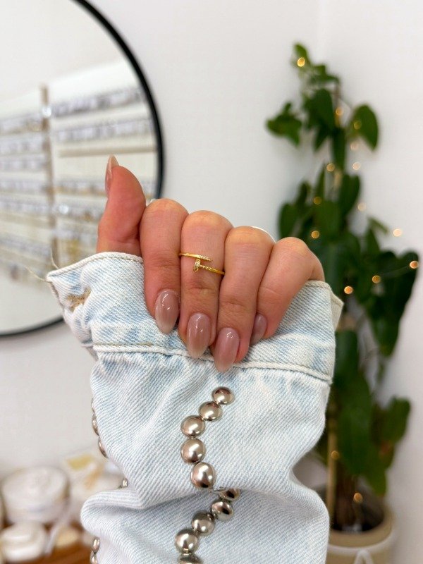 Producto - Anillo acero dorado clavo cúbics talle 6