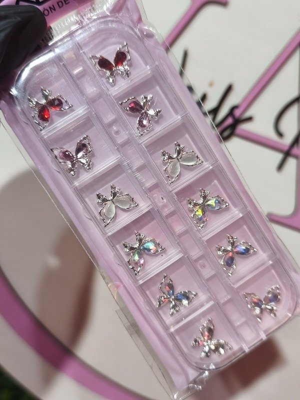 Producto - Dijes mariposa plateadas