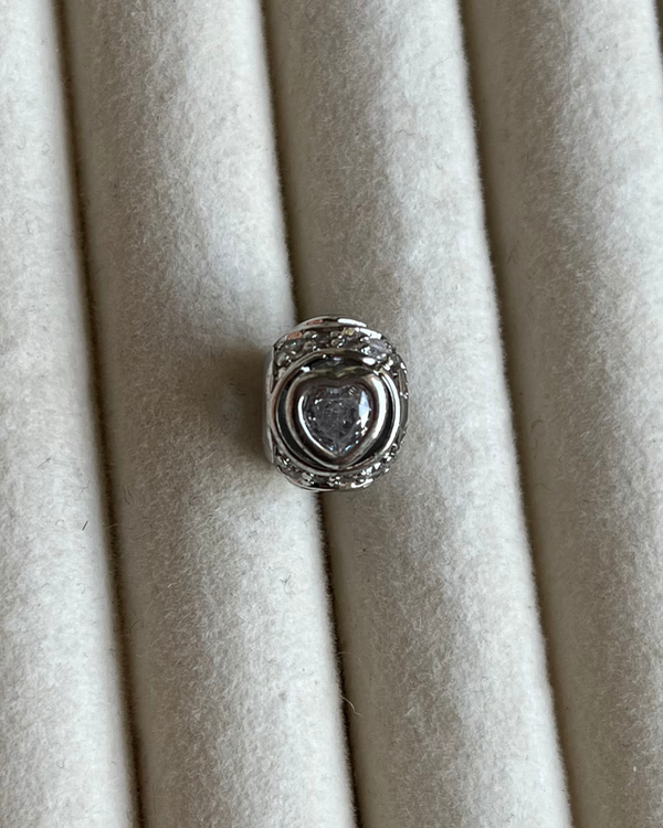 Producto - Dije charm corazon de acero quirúrgico