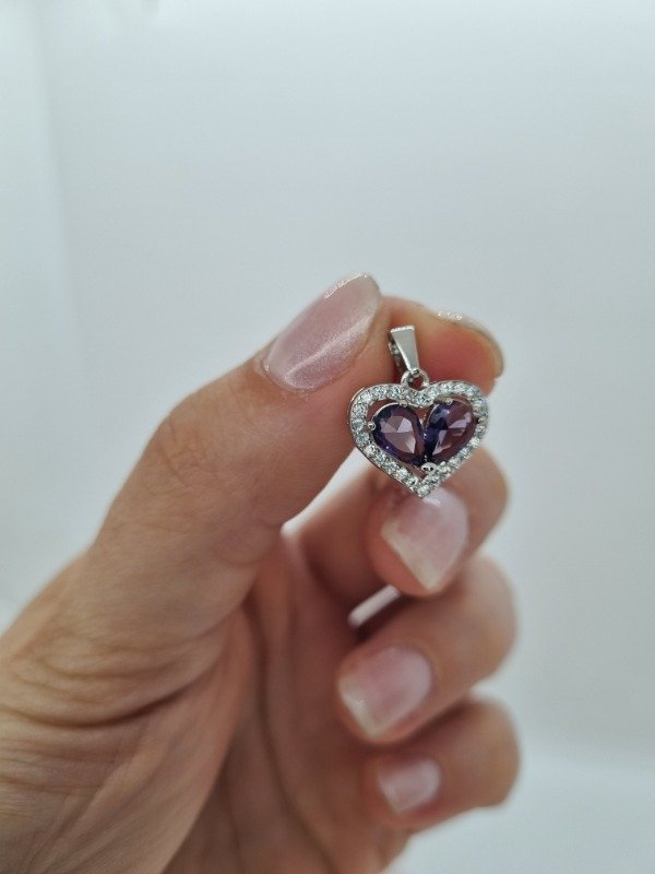 Producto - Dije acero quirurgico corazon doble gema gota borde strass